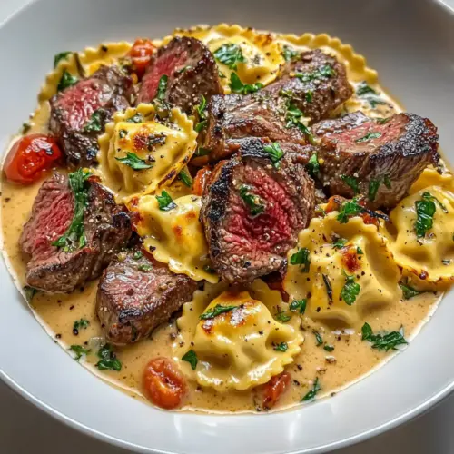 Steak and Ravioli with Creamy Garlic Herb Sauce